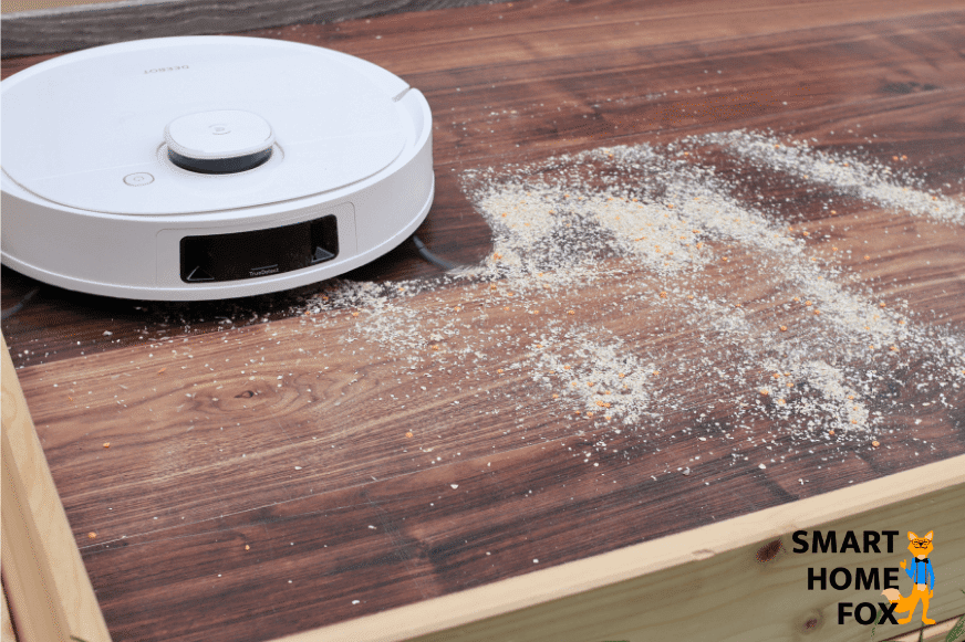 Ecovacs Deebot T9 reinigt Haferflocken beim Saugtest auf einem Hartboden